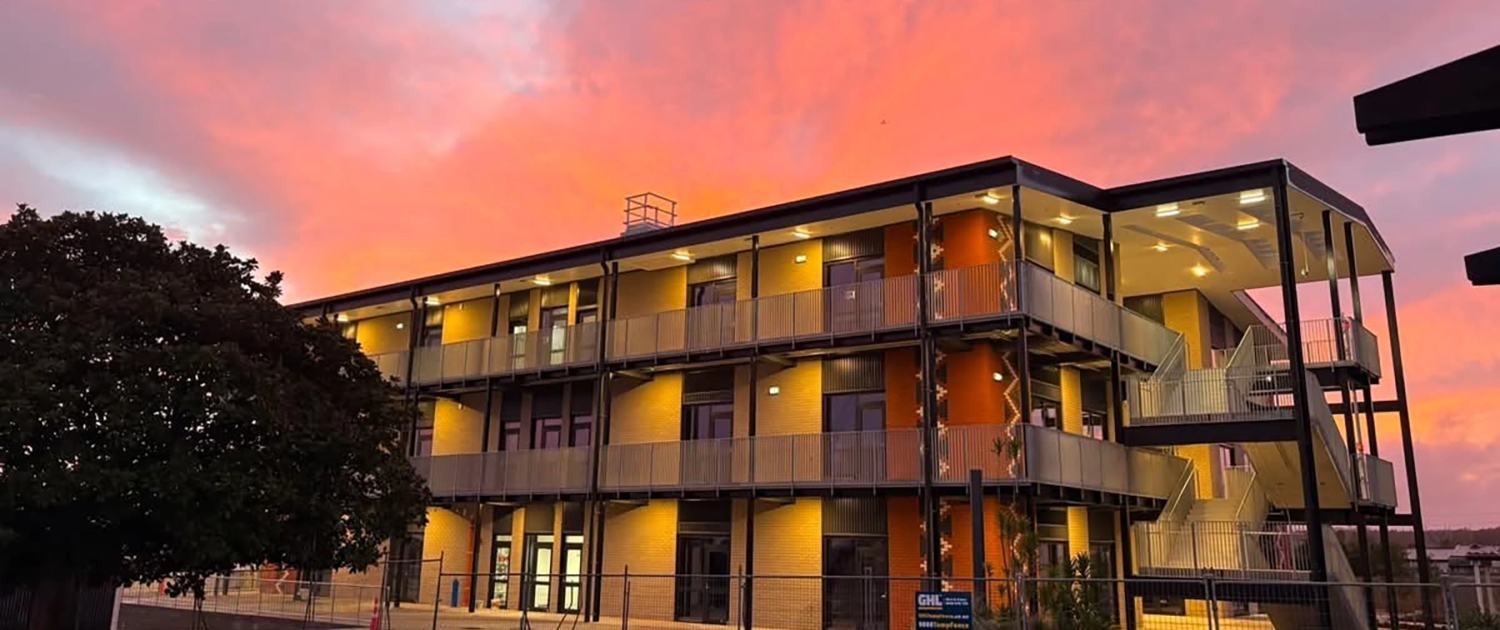 Chapel Downs Junior College Building at sunset